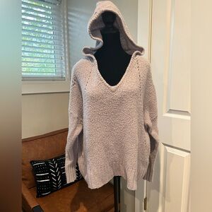 Woman’s Lilac V-neck hooded sweater.
